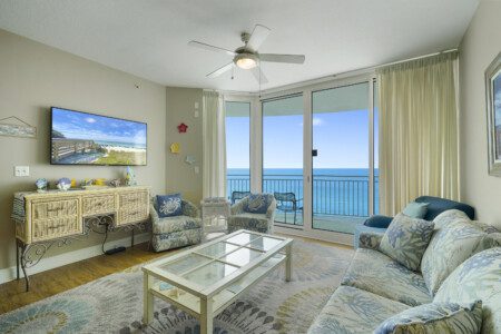 Aqua Resort unit #1209. An image of the living area with views of the Gulf of Mexico, located in Panama City Beach Fl.